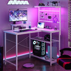 L Shaped Gaming Desk, Reversible Computer Desk with 4-Tier Shelves, Corner Desk with Pegboard, Home Office Desk with LED Lights & Power Outlets Gaming Desk with Storage, White