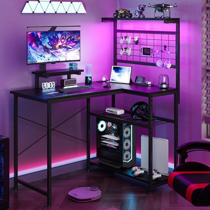 L Shaped Gaming Desk, Reversible Computer Desk with 4-Tier Shelves, Corner Desk with Pegboard, Home Office Desk with LED Lights & Power Outlets Gaming Desk with Storage, Black